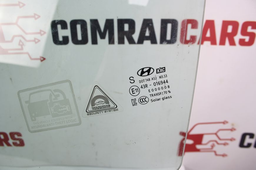 Скло дверей передньої лівої Hyundai Kona 17-22 82410J9050 фото